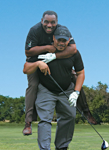 The Thompson brothers goofing around on the golf course